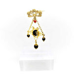 Amuleto spilla su Kokko, in filigrana sarda, onice e corallo Gioielleria Mele