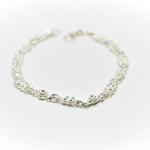 Bracelet with honeycomb buttons in Sardinian filigree, white silver –  Gioielleria Mele