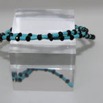 Girocollo con turchesi tubolari e granatine sfaccettate, argento Gioielleria Mele