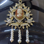 Gioielleria Mele Ciondolo argento dorato su dominu Cameo con volto di donna in madre perla con scaramazze Sa Gioia Gioielleria Mele