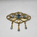 Spilla sa broscia, con strass celesti, argento dorato Gioielleria Mele