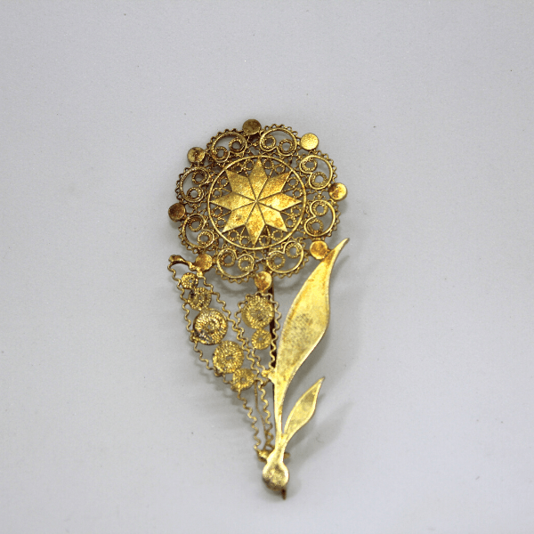 Spilla stella dorgalese, argento dorato Gioielleria Mele