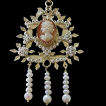 Gioielleria Mele Ciondolo argento dorato su dominu Cameo con volto di donna in madre perla con scaramazze Sa Gioia Gioielleria Mele
