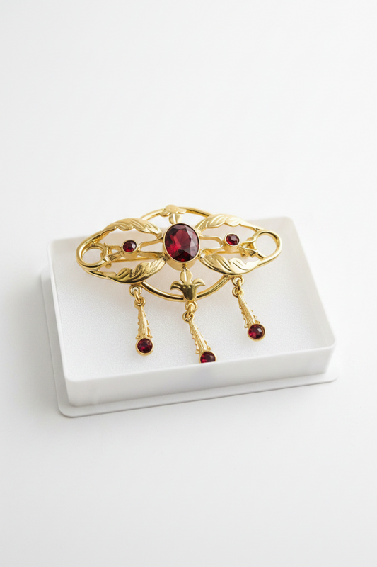 Gioielleria Mele Spilla sa broscia, con strass celesti, argento dorato Gioielleria Mele